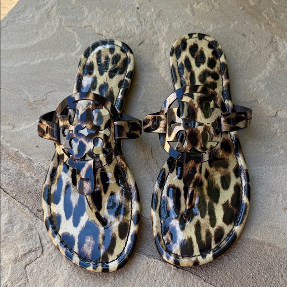 Tory Burch Shoes - TORY BURCH Patent Leather Miller Sandals in Leopard